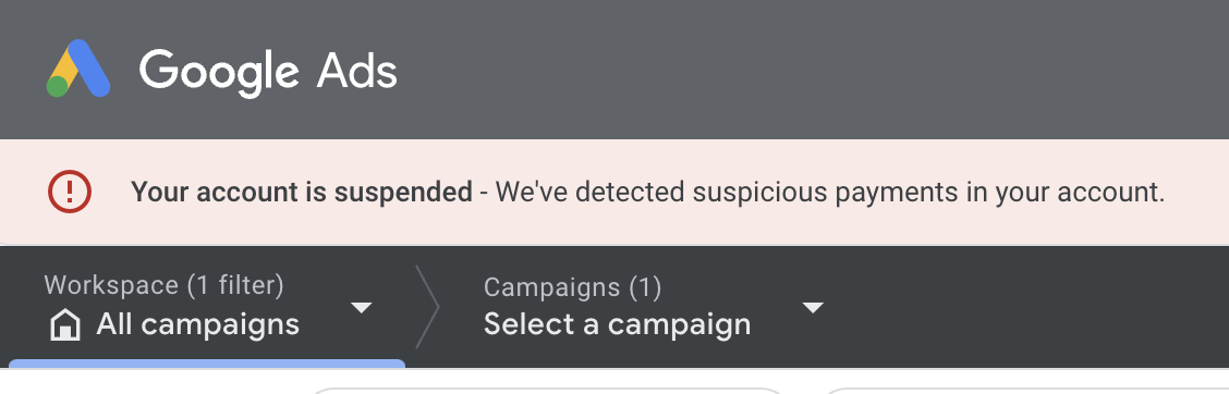 An in-app notification that says: Your account is suspended. We've detected suspicious payments in your account.